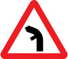 Junction on left bend ahead