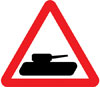 Slow moving military vehicles likely to be crossing or in the road